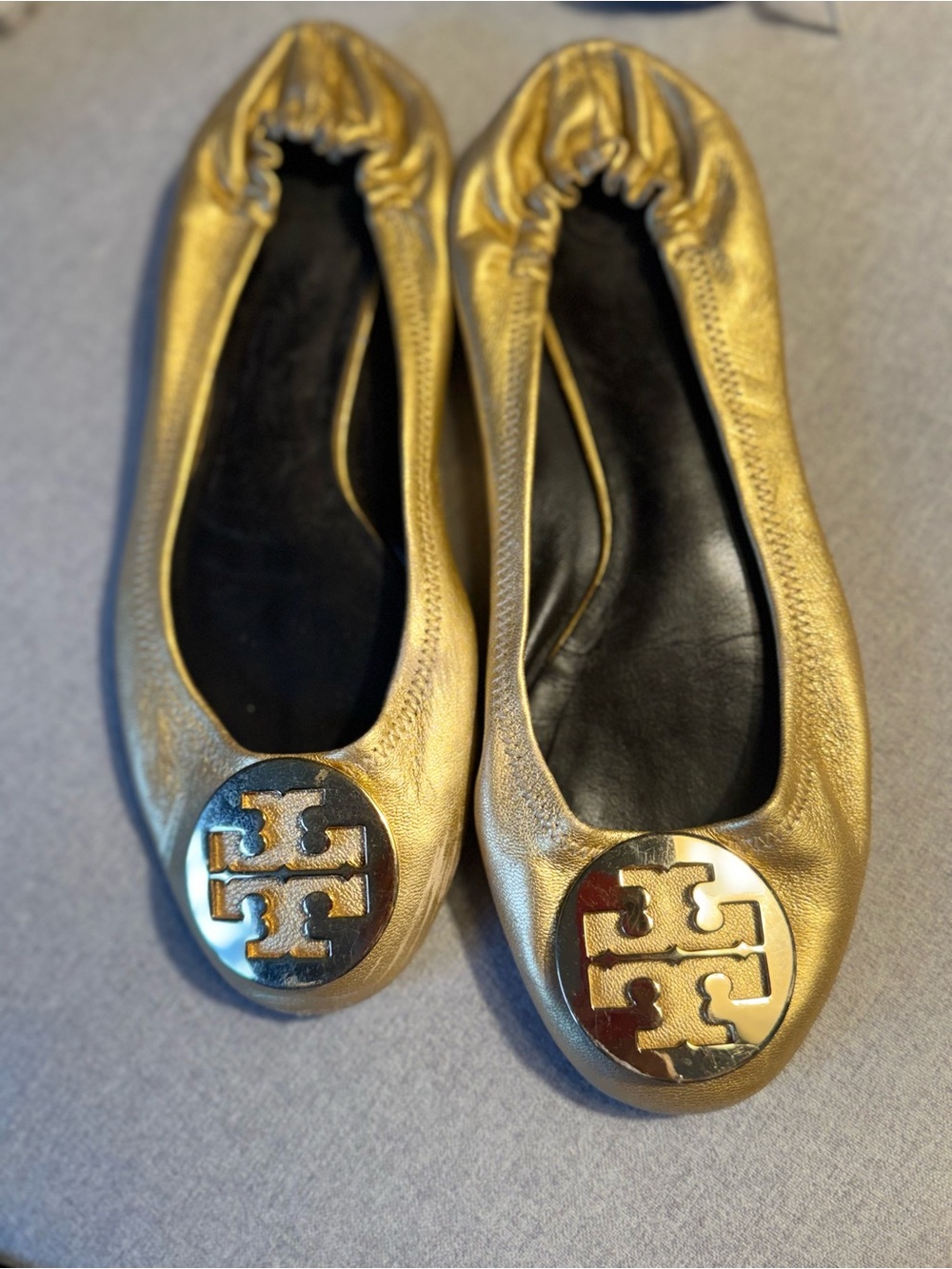 Tory Burch gold flats